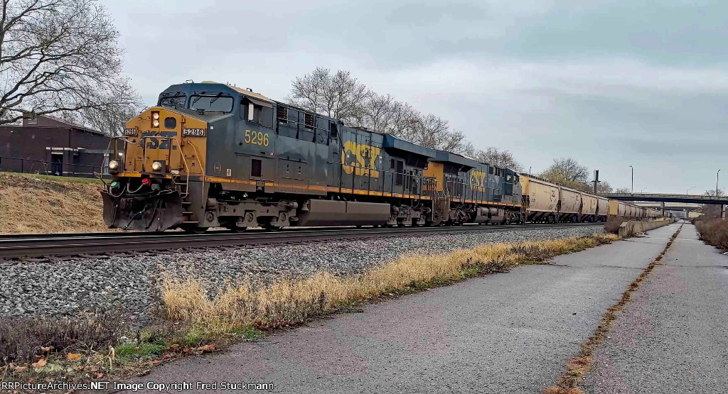 CSX 5296 leads a CSX grain train.